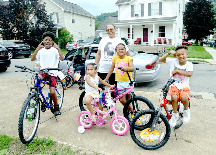 Church collects nearly 100 bikes for community giveaway News, Sports